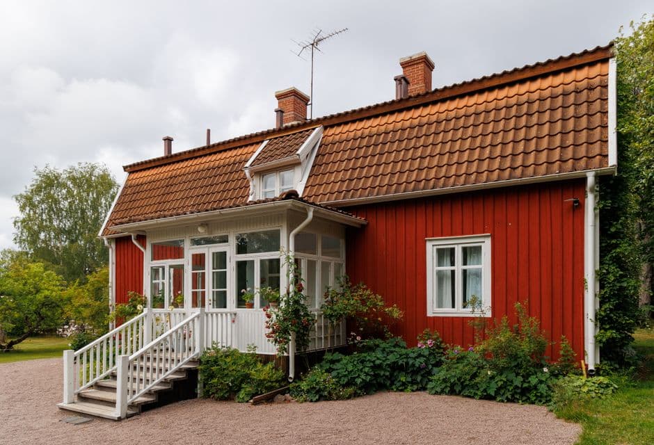 The eaves and soffit of a house roof from below