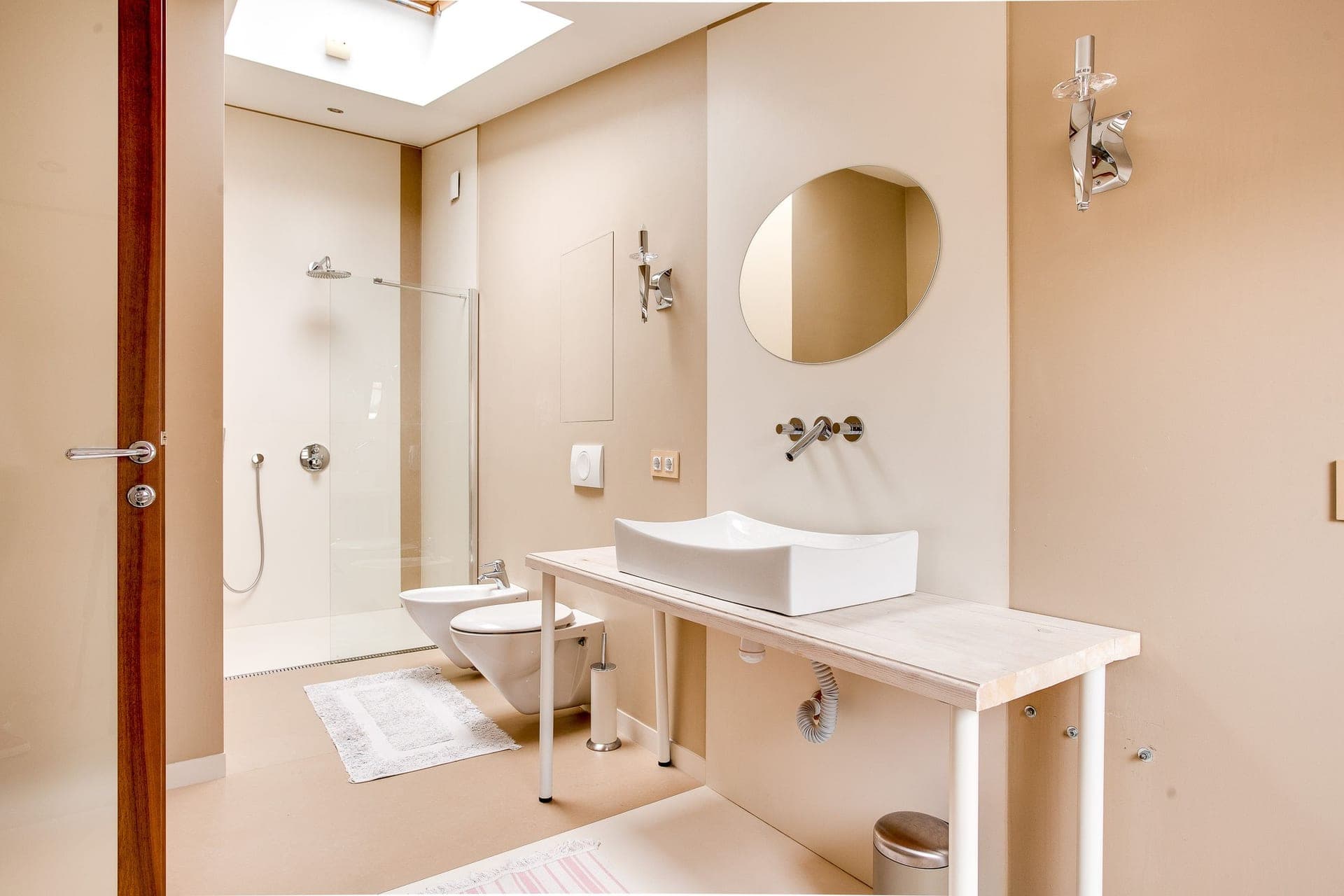 A contemporary bathroom with a walk-in shower