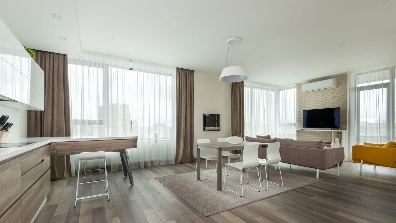 A large open-plan room with windows