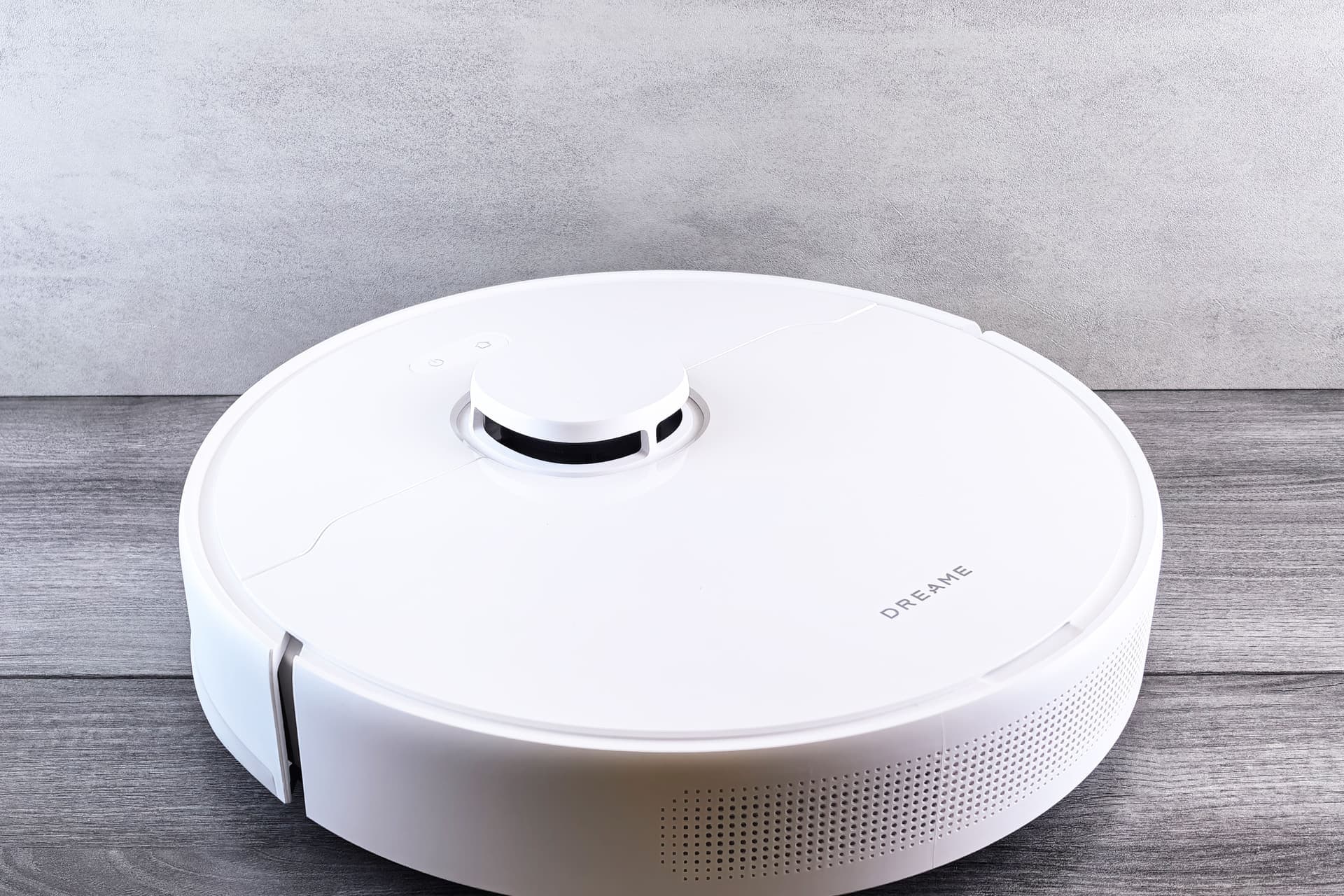 A small white appliance on a wooden floor