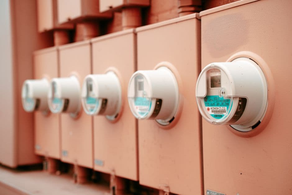A row of electricity meters on a wall