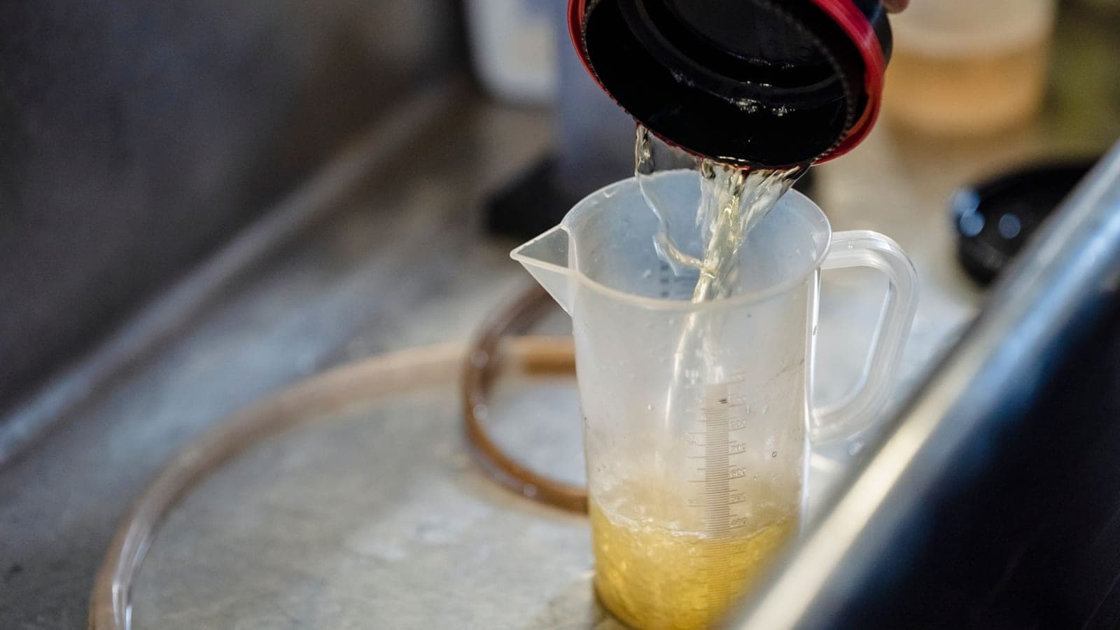 Water being poured into a measuring container