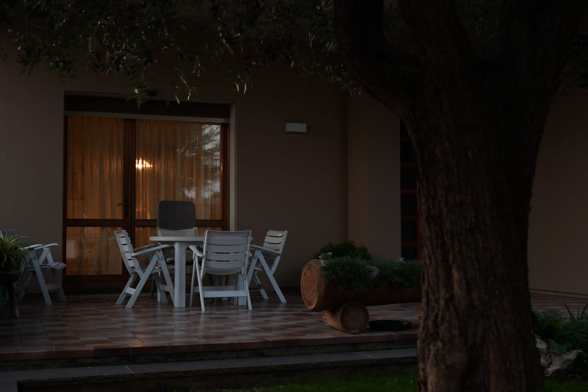 A shaded patio with outdoor seating