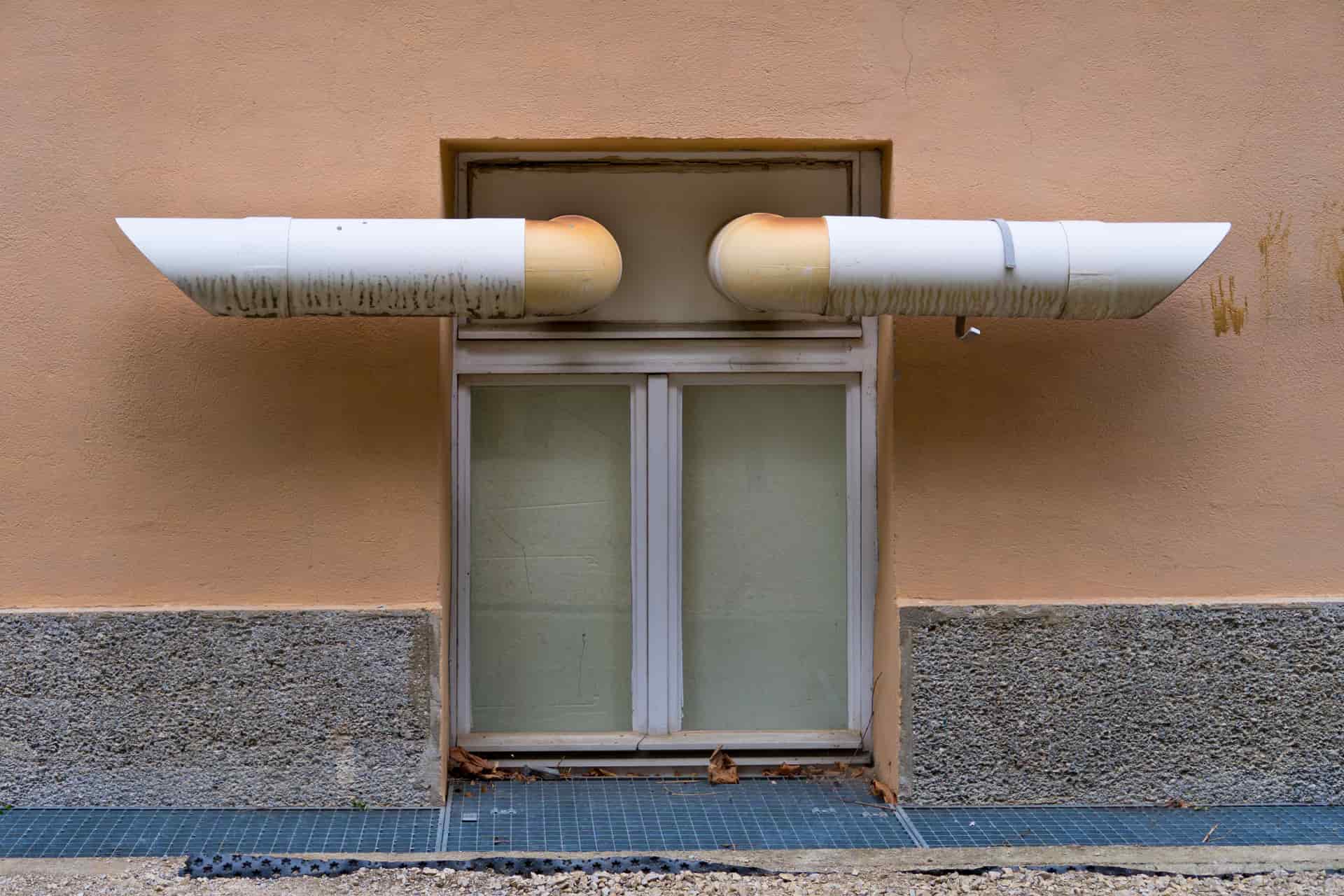 A flexible exhaust duct running to a window