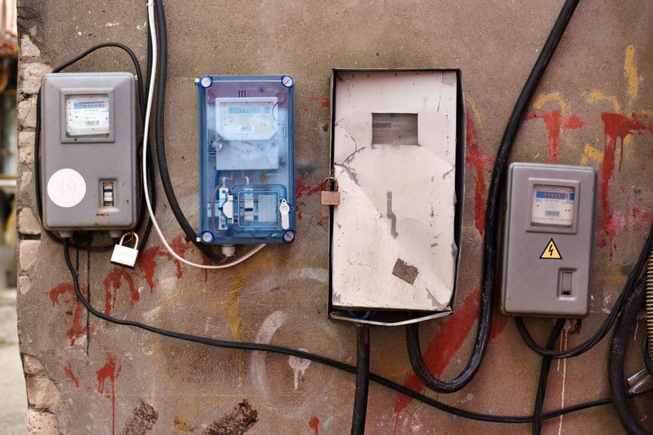 Electricity meters and supply equipment mounted on a wall