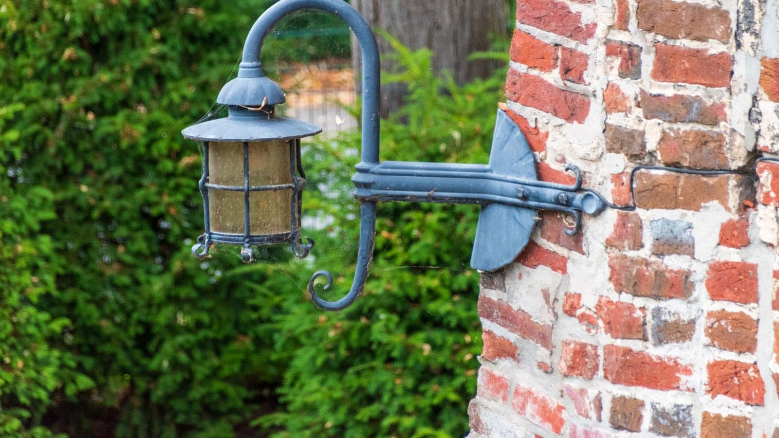 A metal support bracket on an exterior wall