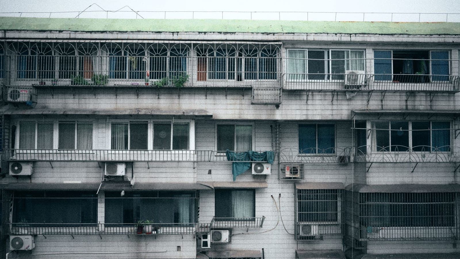 A window air conditioner seen from outside in winter